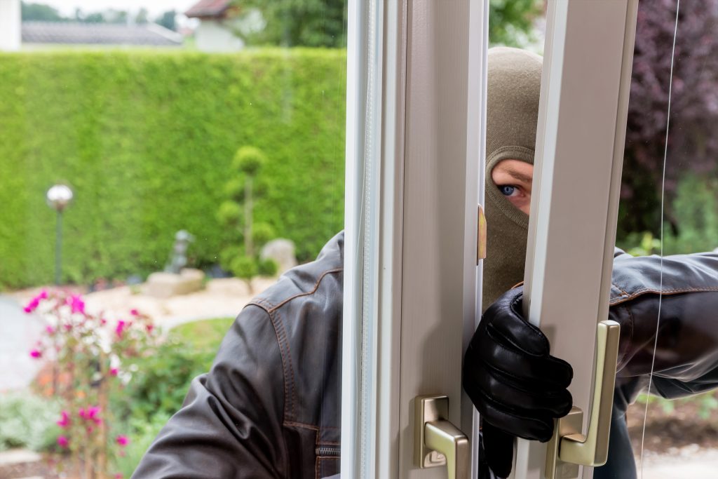 man breaking into home